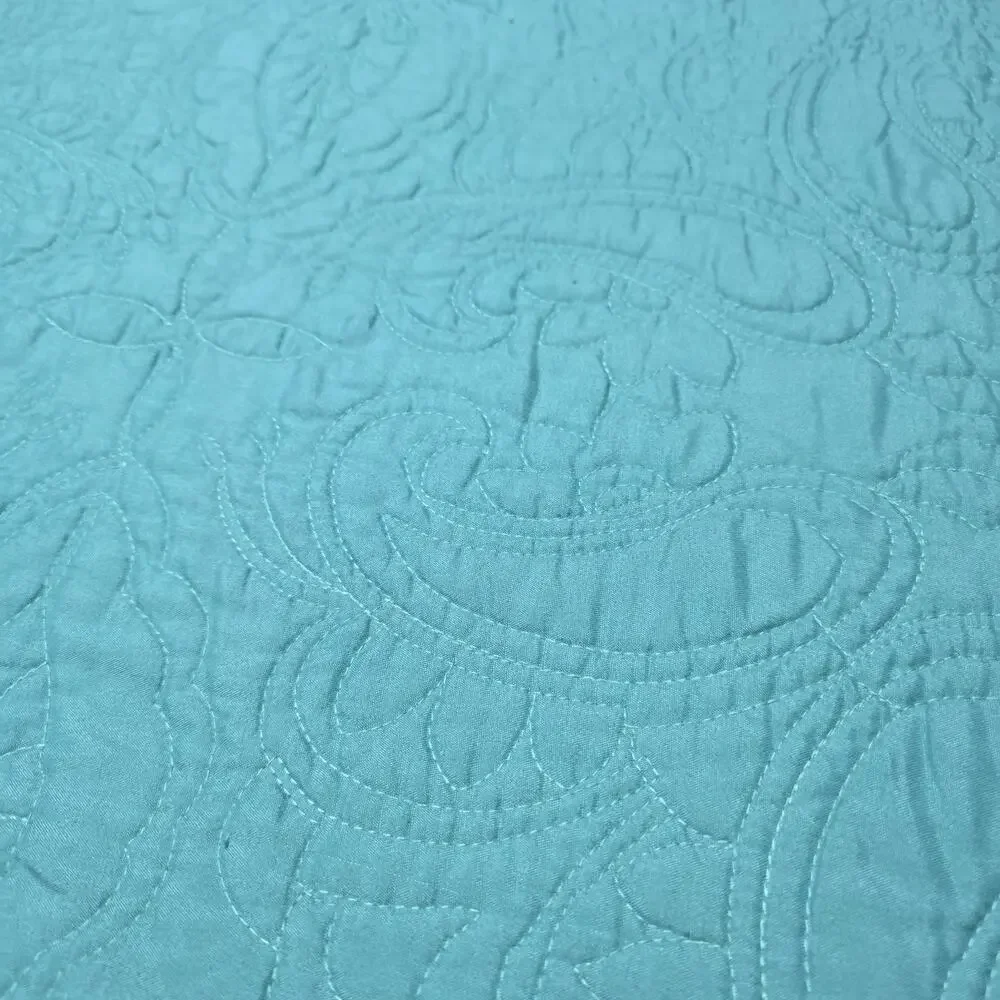 American Pacific teal quilted